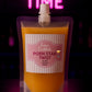 Fusion Cocktails Porn Star Twist cocktail pouch with neon 'Cocktail Time' sign in the background