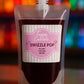 Fusion Cocktails Swizzle Pop packaging with a colorful blurred background